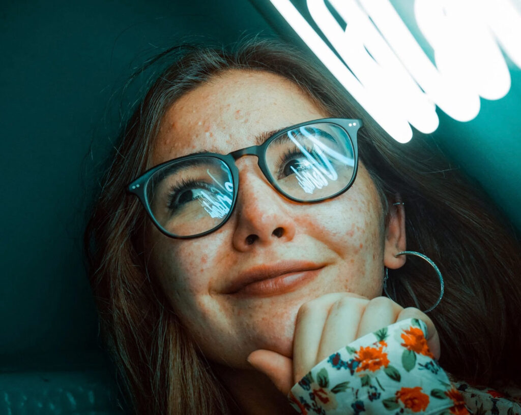 A girl wearing eye glasses