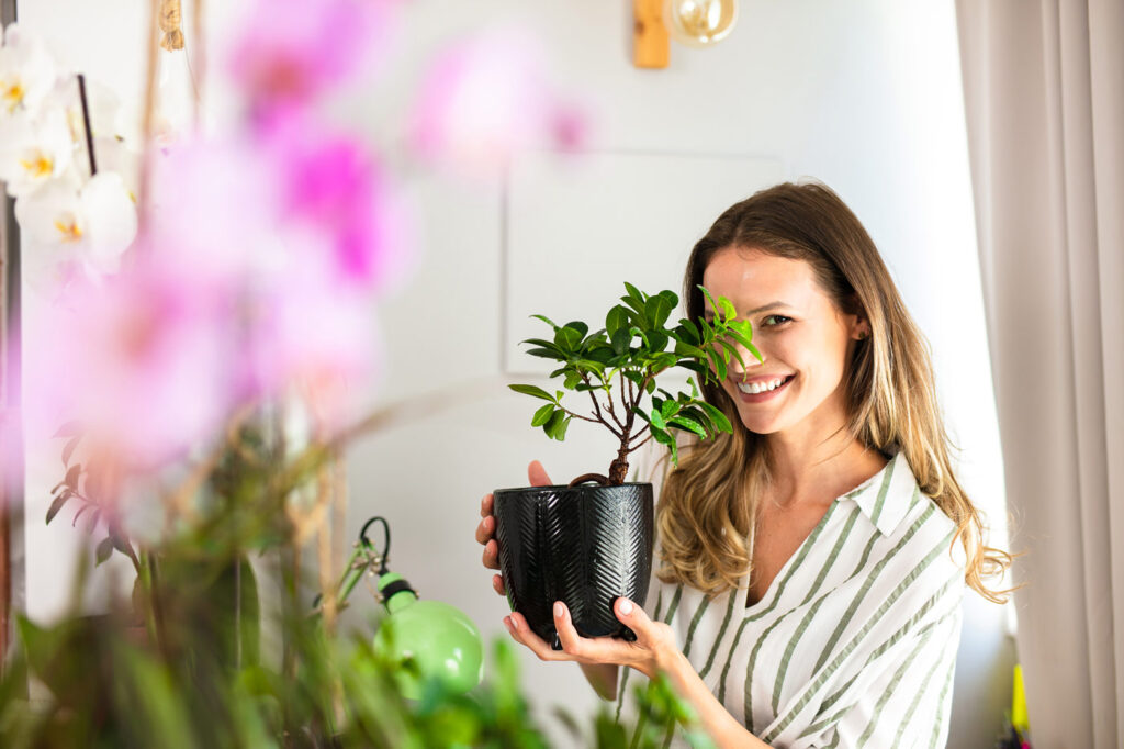 A women taking care of her garden